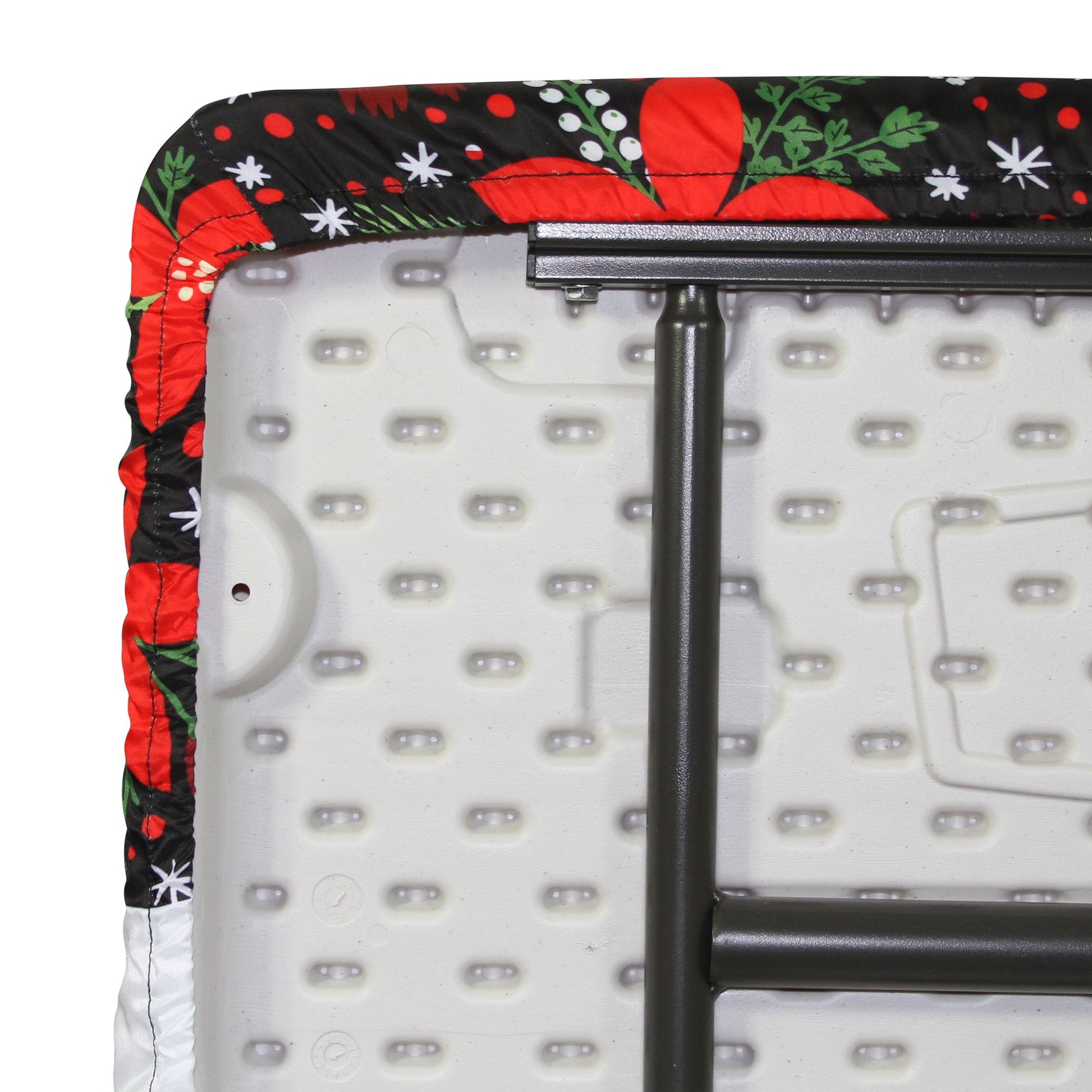 A closeup of a TableCloth PLUS 72" Winter Fitted Polyester Tablecloth for 6' Folding Tables gripping a folding table around the entire table edge