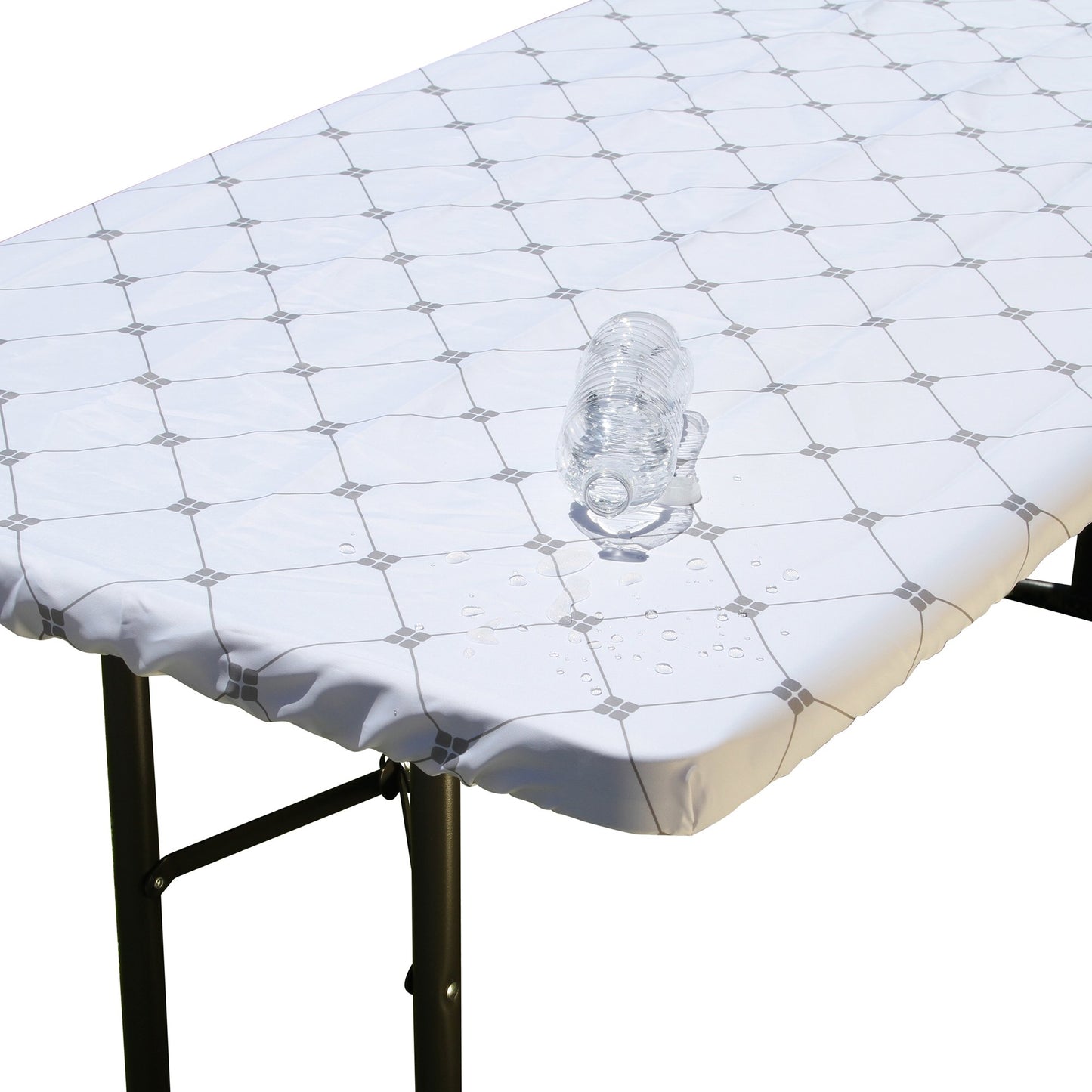 Water beading up on the water resistant surface of TableCloth PLUS 72" Diamonds Polyester Tablecloth for 6' Folding Tables