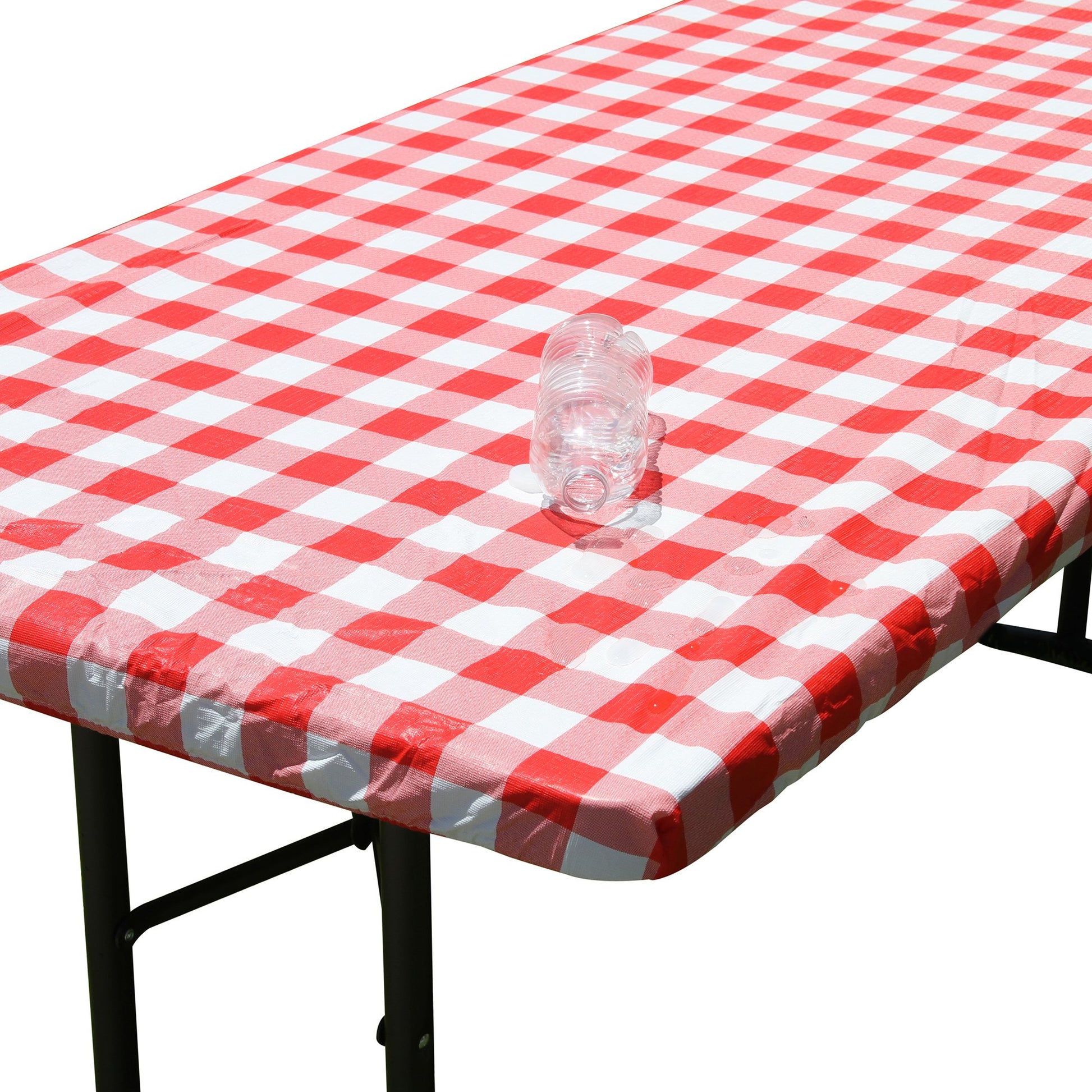 Water beading up on the water resistant surface of TableCloth PLUS 72" Checkerboard Red and White Fitted Polyester Tablecloth for 6' Folding Tables