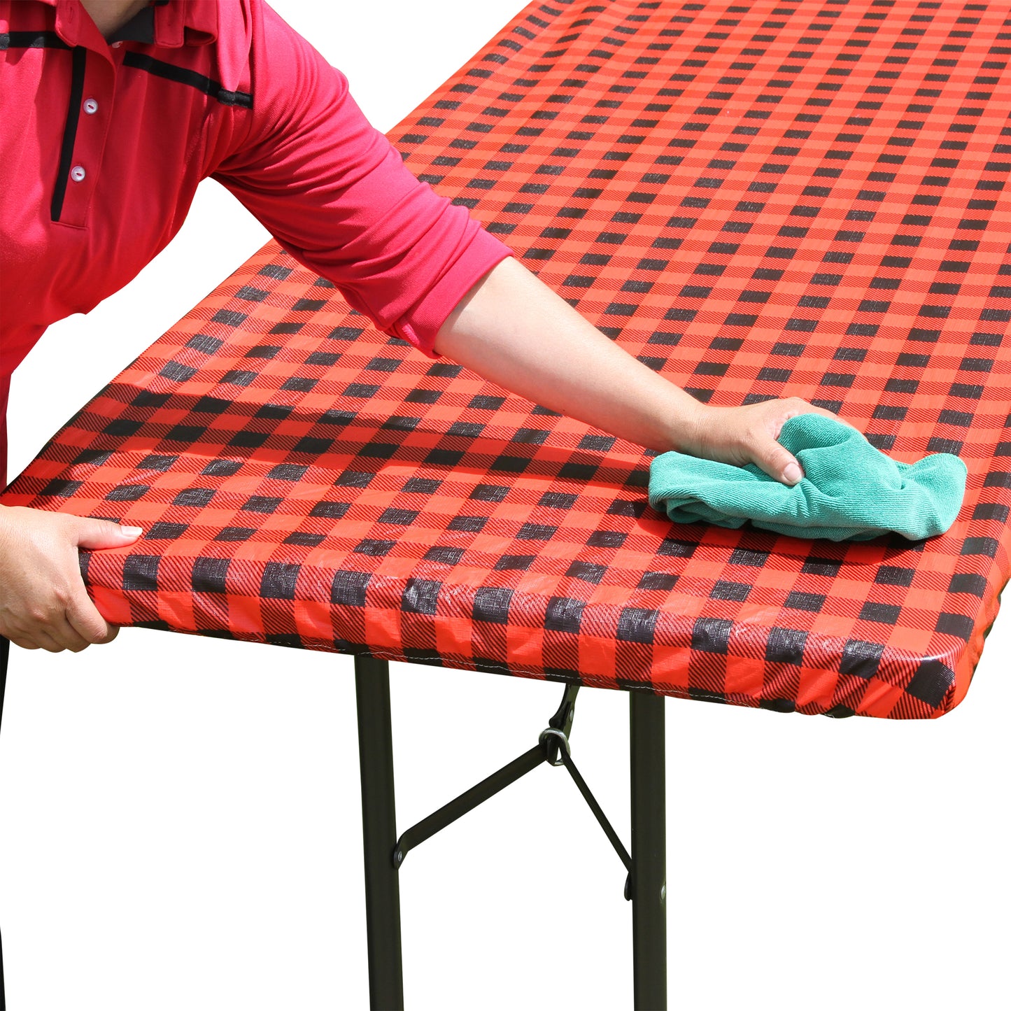 Water beading up on the water resistant surface of TableCloth PLUS 96" Checkerboard Black and Red Fitted PEVA Vinyl Tablecloth for 8' Folding Tables